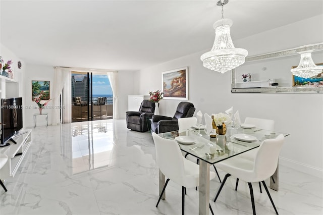 2500 Parkview Dr Unit 2303, Hallandale Beach, FL 33009 - dining room with marble finish floor and an inviting chandelier