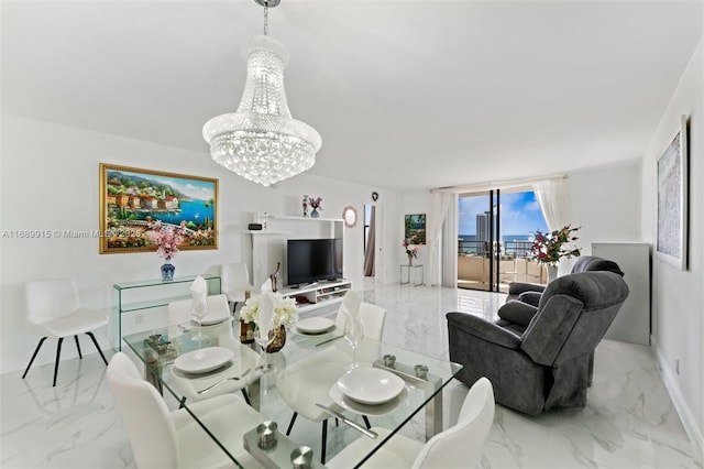 2500 Parkview Dr Unit 2303, Hallandale Beach, FL 33009 - dining area with marble finish floor and a notable chandelier