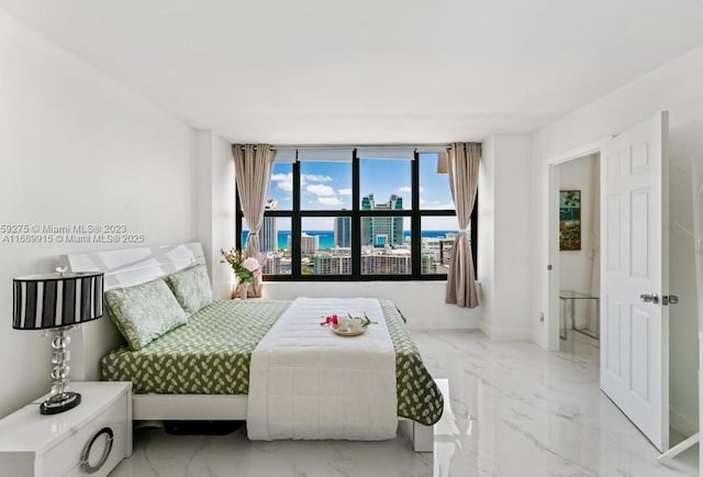 2500 Parkview Dr Unit 2303, Hallandale Beach, FL 33009 - bedroom with baseboards and marble finish floor