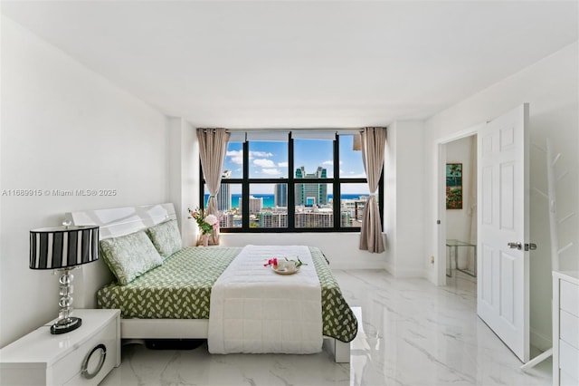 2500 Parkview Dr Unit 2303, Hallandale Beach, FL 33009 - bedroom with baseboards and marble finish floor