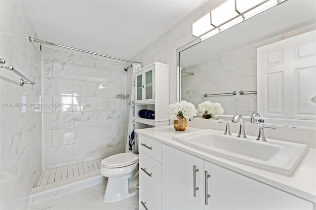 2500 Parkview Dr Unit 2303, Hallandale Beach, FL 33009 - full bathroom with toilet, a tile shower, tile walls, marble finish floor, and vanity