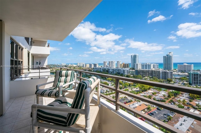 balcony featuring a water view