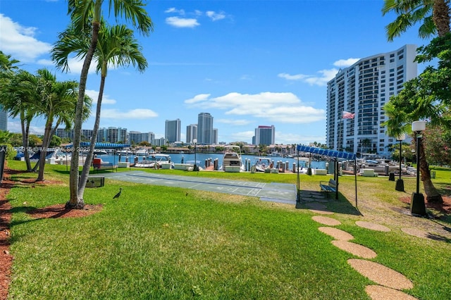 2500 Parkview Dr Unit 2303, Hallandale Beach, FL 33009 - view of property's community featuring a water view, shuffleboard, a view of city, and a lawn