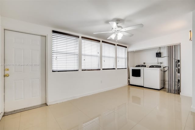 interior space with ceiling fan and separate washer and dryer