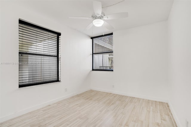 unfurnished room with light hardwood / wood-style floors and ceiling fan