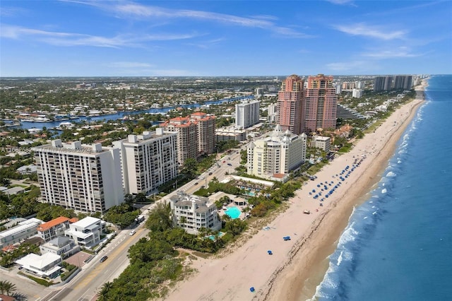 aerial view with a view of the beach and a water view