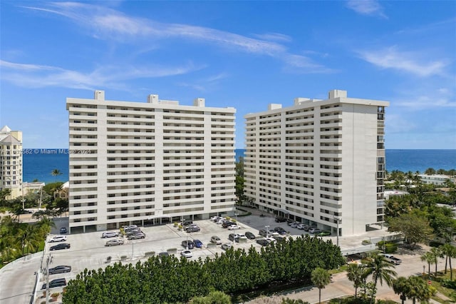 view of building exterior with a water view