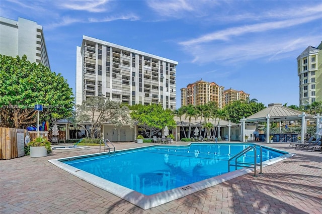 view of pool featuring a gazebo and a patio area