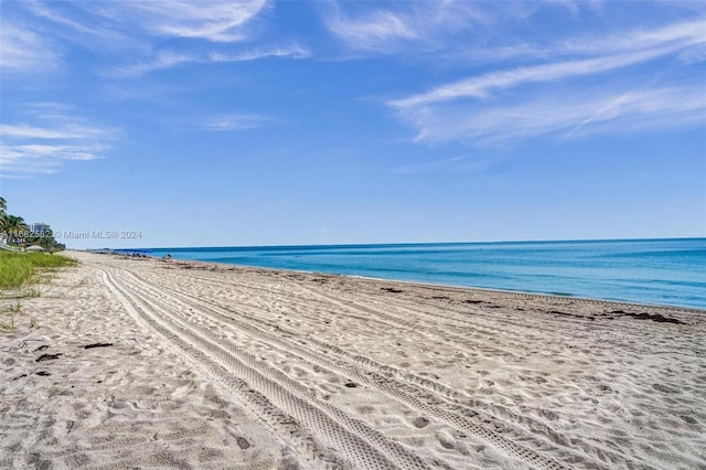 property view of water with a beach view