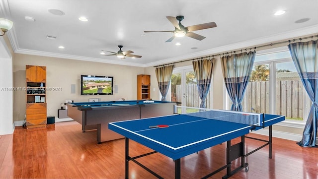 recreation room featuring wood-type flooring, ceiling fan, crown molding, and pool table