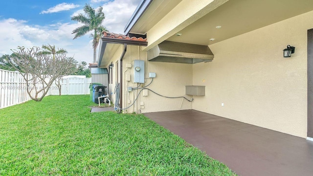 exterior space featuring a yard and a patio