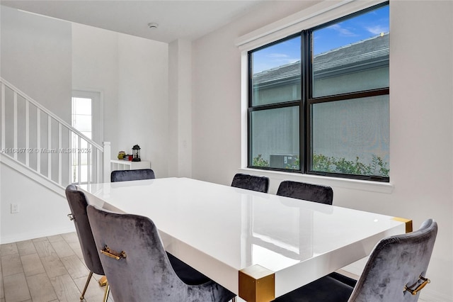 dining area with light hardwood / wood-style floors