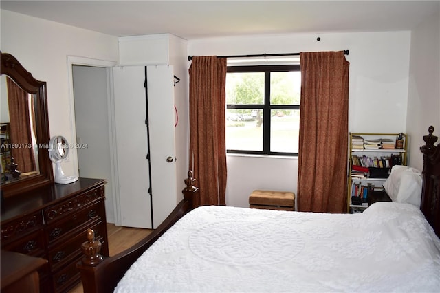 bedroom with light wood-type flooring