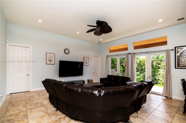 living room featuring ceiling fan, light tile patterned floors, and french doors