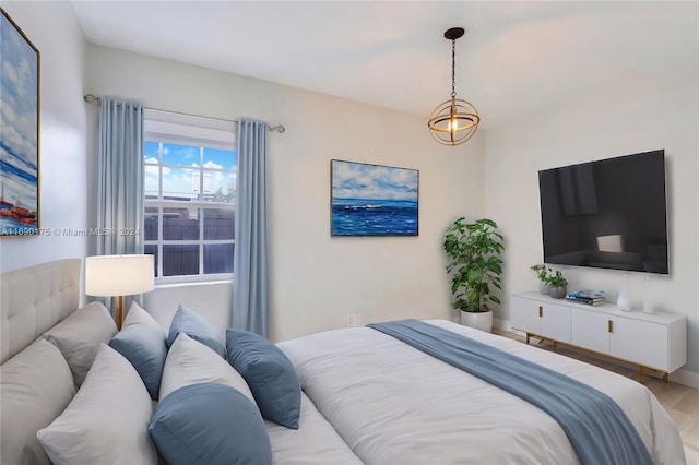 bedroom featuring light wood-type flooring