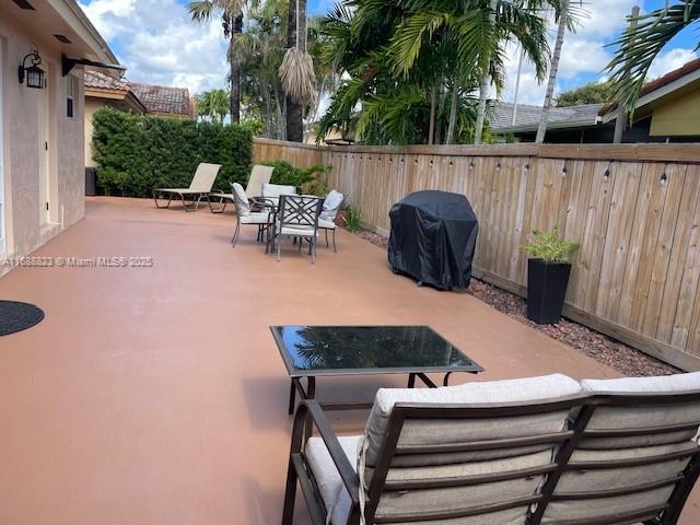 view of patio featuring area for grilling and outdoor lounge area