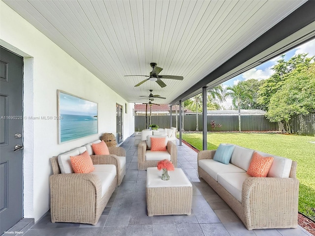 view of patio with ceiling fan and an outdoor hangout area