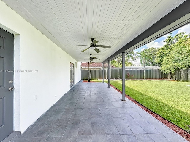 view of patio featuring ceiling fan