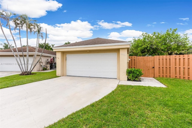 garage featuring a yard