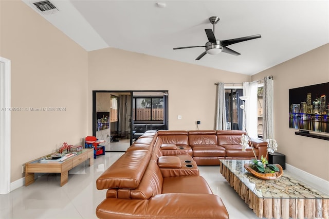 tiled living room featuring vaulted ceiling and ceiling fan