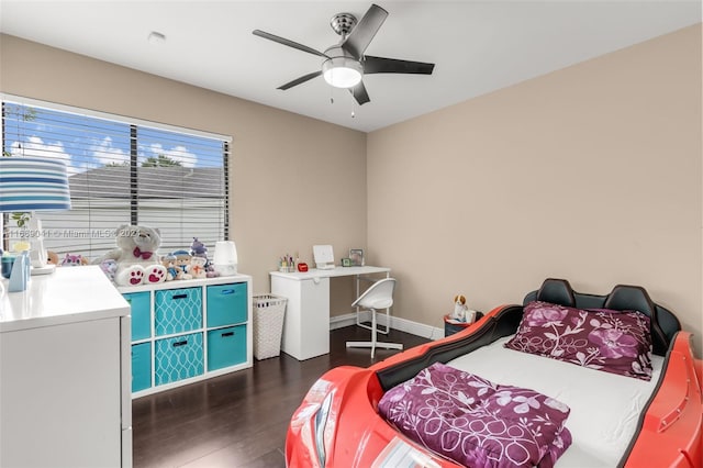 bedroom with dark wood-type flooring and ceiling fan