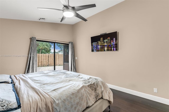 bedroom with access to outside, hardwood / wood-style floors, and ceiling fan