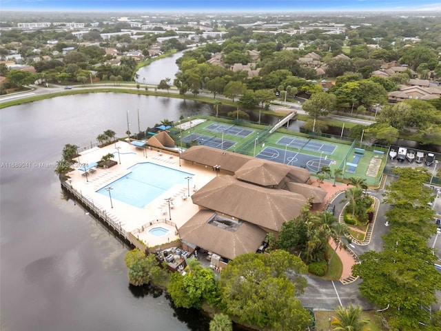 birds eye view of property with a water view