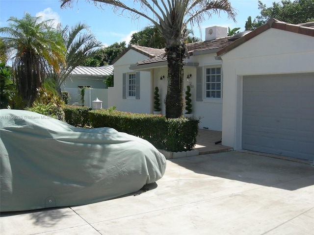 ranch-style home with a garage