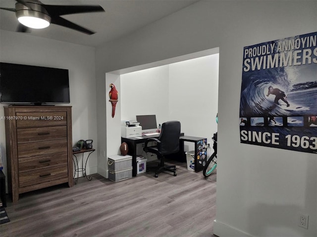 office area with wood-type flooring and ceiling fan