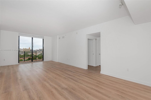 empty room featuring light hardwood / wood-style flooring