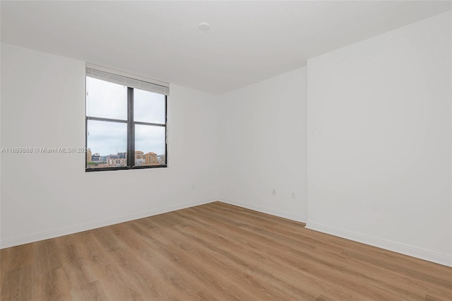 empty room featuring light hardwood / wood-style floors