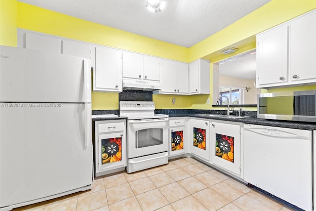 kitchen featuring white cabinetry, white appliances, sink, and light tile patterned floors