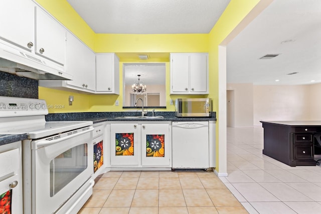 kitchen featuring white cabinetry, sink, white appliances, and light tile patterned floors