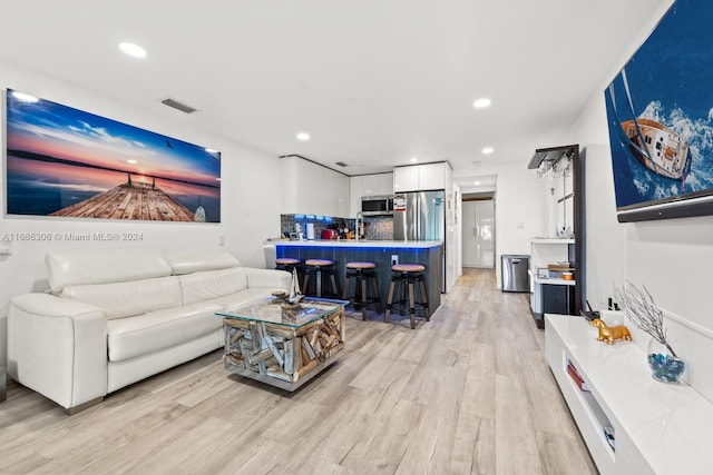 living room featuring light hardwood / wood-style floors