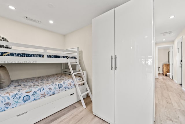 bedroom featuring light wood-type flooring