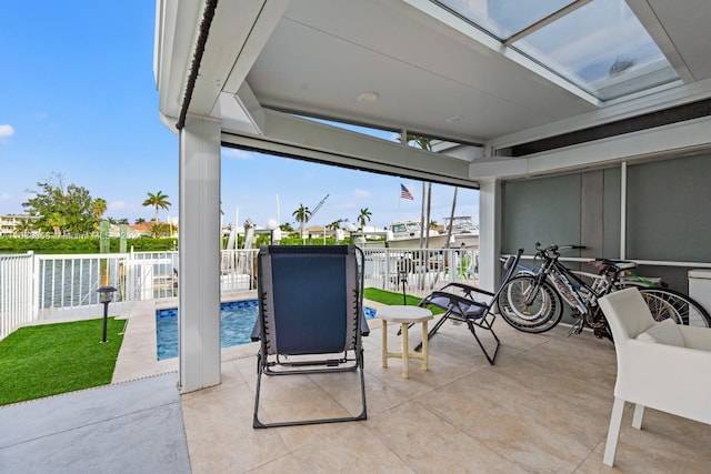 view of patio with a fenced in pool