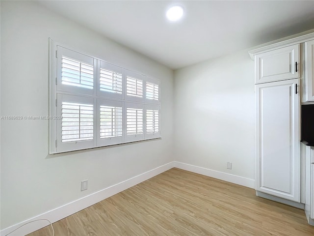 empty room featuring light wood-type flooring