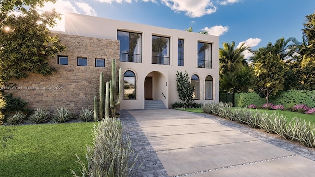 modern home featuring a front yard