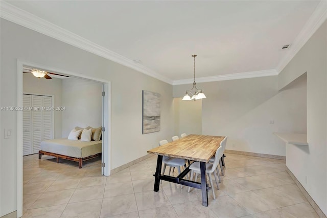 tiled dining area with ceiling fan with notable chandelier and crown molding