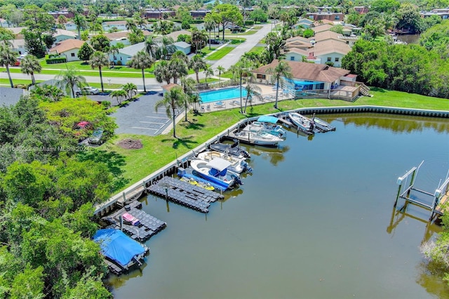 birds eye view of property featuring a water view