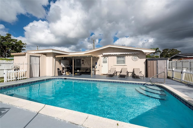 view of pool with a patio area