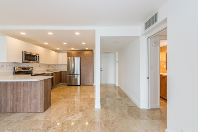 kitchen featuring sink and stainless steel appliances