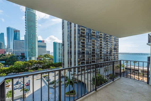 balcony featuring a water view