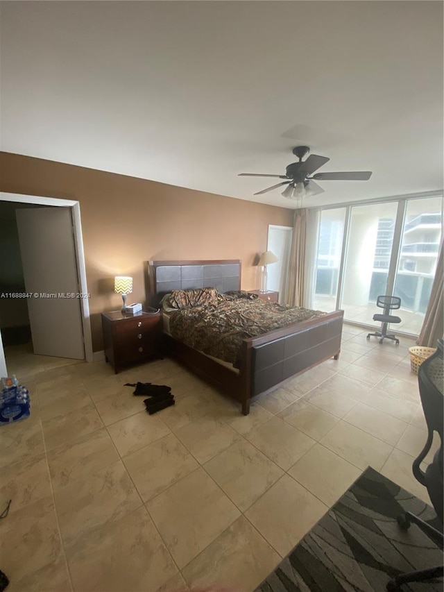 bedroom featuring ceiling fan and light tile patterned flooring