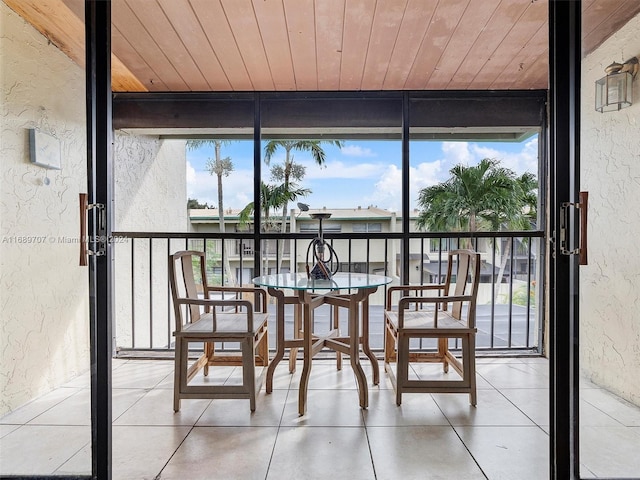 sunroom with wood ceiling