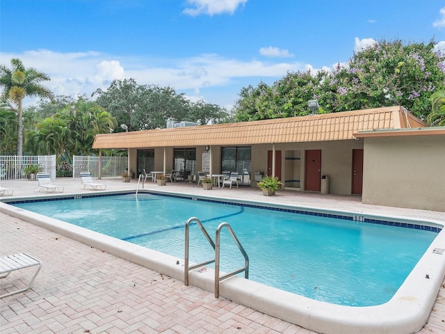 view of pool featuring a patio area