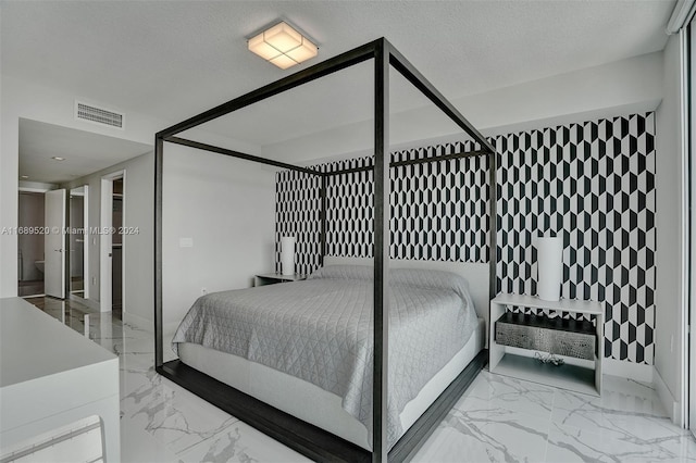 bedroom with a textured ceiling