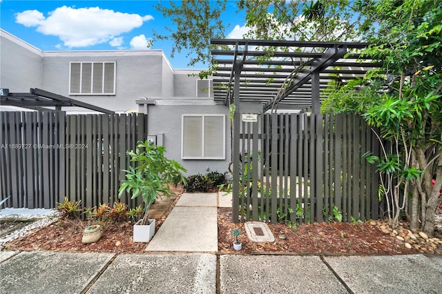 exterior space with a pergola