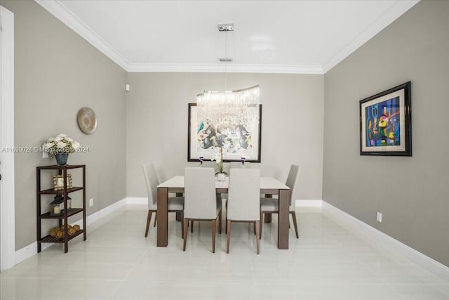 tiled dining space featuring a chandelier and ornamental molding