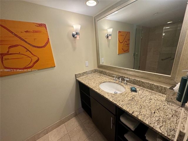 bathroom with vanity and tile patterned floors